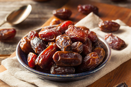 Fresh dates placed in a bowl.