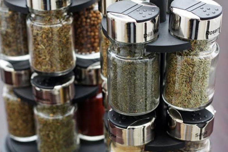 Picture of spices stacked in a spice rack